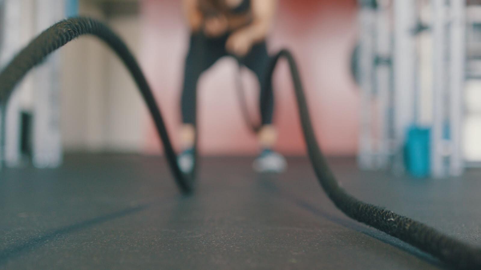 Photo by Chase Kinney person holding black exercise rope