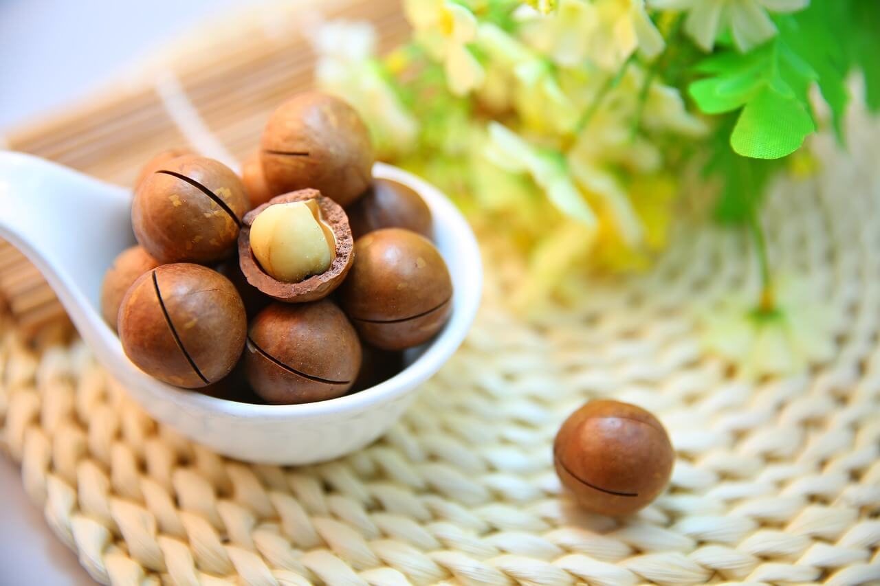 A bowl of macadamia nuts on a table